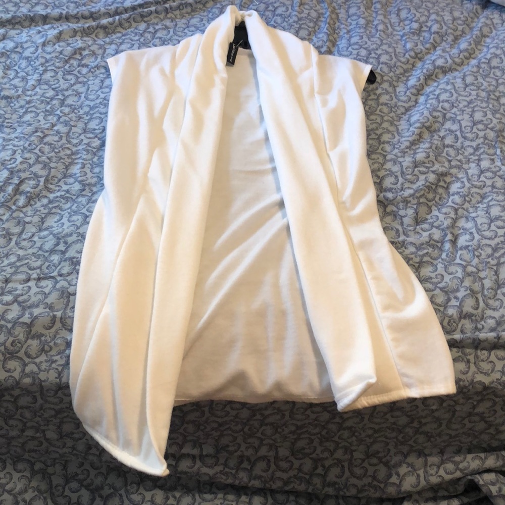 Sleeveless white fleece vest